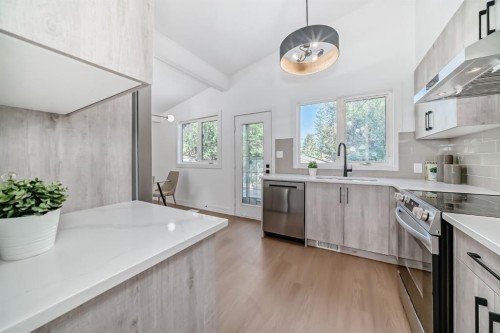 129 Glenpatrick Drive Sw, Calgary, AB - Indoor Photo Showing Kitchen With Upgraded Kitchen