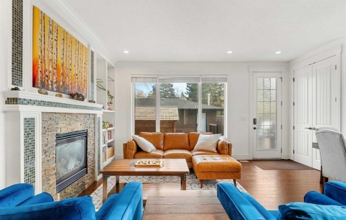 4530 20 Avenue Nw, Calgary, AB - Indoor Photo Showing Living Room With Fireplace