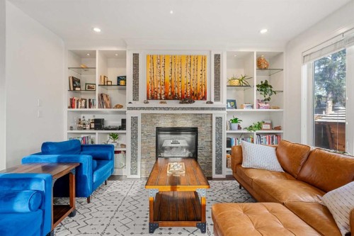 4530 20 Avenue Nw, Calgary, AB - Indoor Photo Showing Living Room With Fireplace