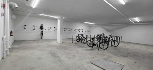516-8230 Broadcast Avenue Sw, Calgary, AB - Indoor Photo Showing Garage