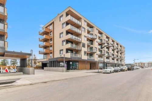 516-8230 Broadcast Avenue Sw, Calgary, AB - Outdoor With Balcony With Facade