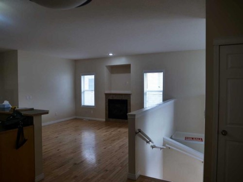 742 Carriage Lane Drive, Carstairs, AB - Indoor With Fireplace