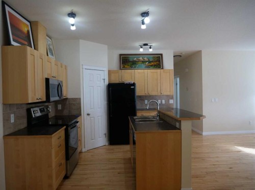 742 Carriage Lane Drive, Carstairs, AB - Indoor Photo Showing Kitchen