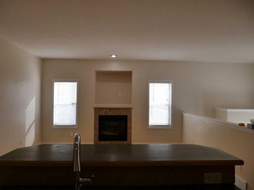 742 Carriage Lane Drive, Carstairs, AB - Indoor With Fireplace