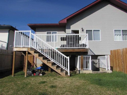 742 Carriage Lane Drive, Carstairs, AB - Outdoor With Deck Patio Veranda With Exterior