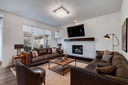 425 Auburn Bay Drive Se, Calgary, AB - Indoor Photo Showing Living Room With Fireplace
