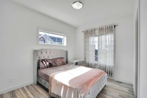 457 Canals Crossing Sw, Airdrie, AB - Indoor Photo Showing Bedroom
