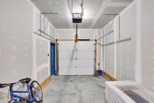 457 Canals Crossing Sw, Airdrie, AB - Indoor Photo Showing Garage