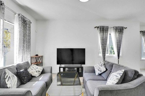 457 Canals Crossing Sw, Airdrie, AB - Indoor Photo Showing Living Room