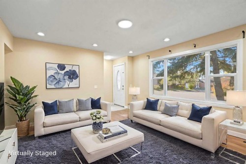 67 Fallswater Crescent Ne, Calgary, AB - Indoor Photo Showing Living Room