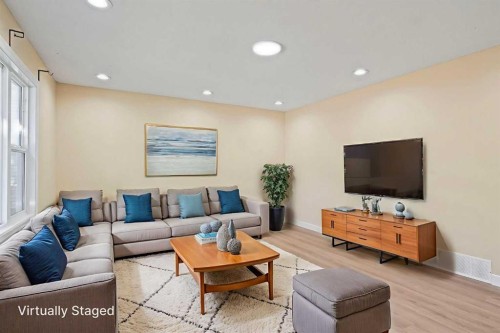 67 Fallswater Crescent Ne, Calgary, AB - Indoor Photo Showing Living Room