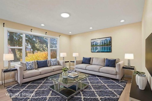 67 Fallswater Crescent Ne, Calgary, AB - Indoor Photo Showing Living Room