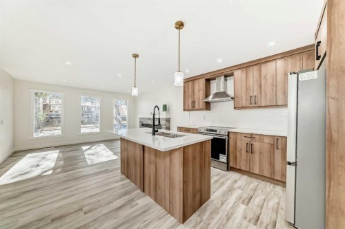946 Berkley Drive Nw, Calgary, AB - Indoor Photo Showing Kitchen With Double Sink