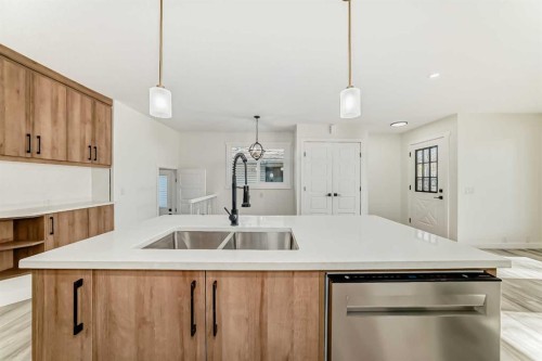 946 Berkley Drive Nw, Calgary, AB - Indoor Photo Showing Kitchen With Double Sink