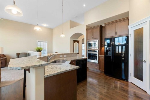 70 Muirfield Boulevard, Lyalta, AB - Indoor Photo Showing Kitchen With Double Sink With Upgraded Kitchen