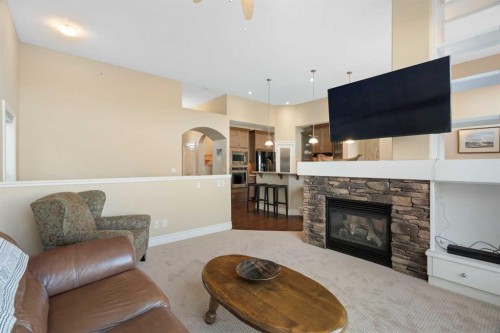 70 Muirfield Boulevard, Lyalta, AB - Indoor Photo Showing Living Room With Fireplace