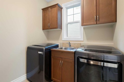 70 Muirfield Boulevard, Lyalta, AB - Indoor Photo Showing Laundry Room