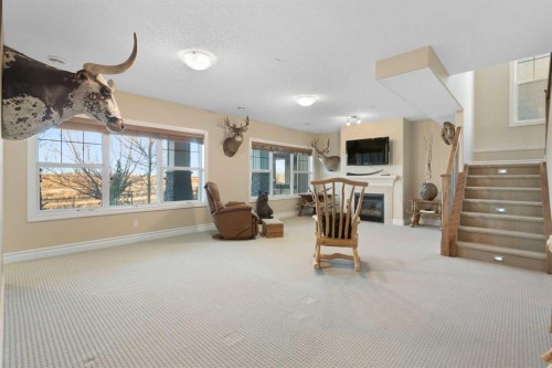 70 Muirfield Boulevard, Lyalta, AB - Indoor With Fireplace