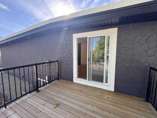 128 Cantrell Place Sw, Calgary, AB - Outdoor With Deck Patio Veranda With Exterior