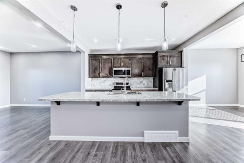 392 Auburn Crest Way Se, Calgary, AB - Indoor Photo Showing Kitchen With Upgraded Kitchen
