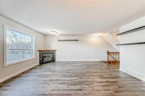 184 Mt Aberdeen Manor Se, Calgary, AB - Indoor With Fireplace