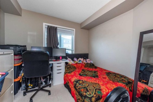 203-5 Saddlestone Way Ne, Calgary, AB - Indoor Photo Showing Bedroom