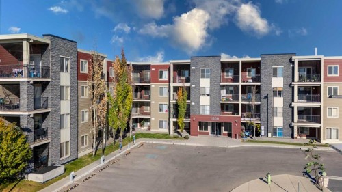 203-5 Saddlestone Way Ne, Calgary, AB - Outdoor With Balcony With Facade