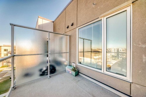 403-200 Shawnee Square Sw, Calgary, AB - Outdoor With Balcony With Exterior