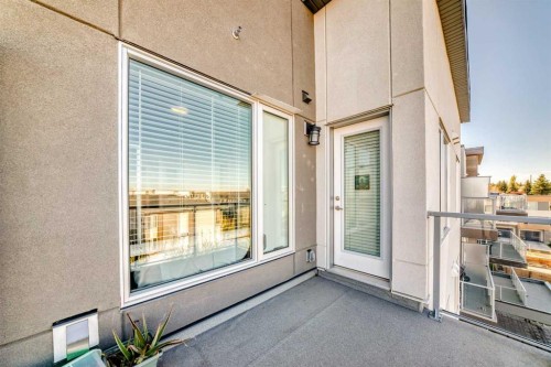 403-200 Shawnee Square Sw, Calgary, AB - Outdoor With Balcony With Exterior