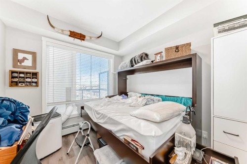403-200 Shawnee Square Sw, Calgary, AB - Indoor Photo Showing Bedroom