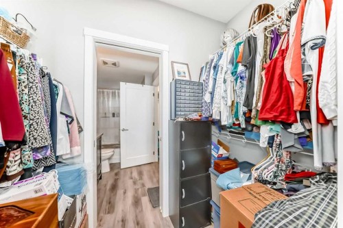 403-200 Shawnee Square Sw, Calgary, AB - Indoor With Storage