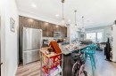 403-200 Shawnee Square Sw, Calgary, AB  - Indoor Photo Showing Kitchen With Upgraded Kitchen 