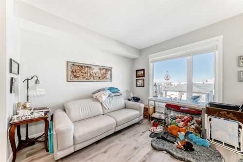 403-200 Shawnee Square Sw, Calgary, AB - Indoor Photo Showing Other Room