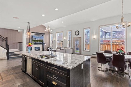269 Kinniburgh Boulevard, Chestermere, AB - Indoor Photo Showing Kitchen With Double Sink With Upgraded Kitchen