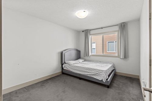 269 Kinniburgh Boulevard, Chestermere, AB - Indoor Photo Showing Bedroom