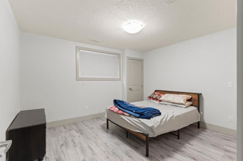269 Kinniburgh Boulevard, Chestermere, AB - Indoor Photo Showing Bedroom