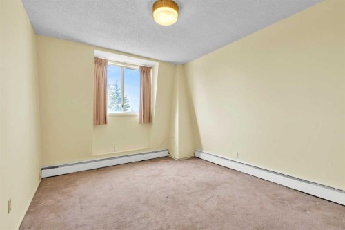 301-508 Cedar Crescent Sw, Calgary, AB - Indoor Photo Showing Other Room