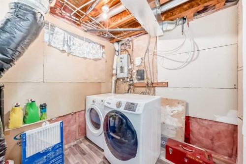 61 San Diego Way Ne, Calgary, AB - Indoor Photo Showing Laundry Room
