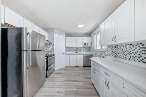 61 San Diego Way Ne, Calgary, AB - Indoor Photo Showing Kitchen With Stainless Steel Kitchen With Upgraded Kitchen