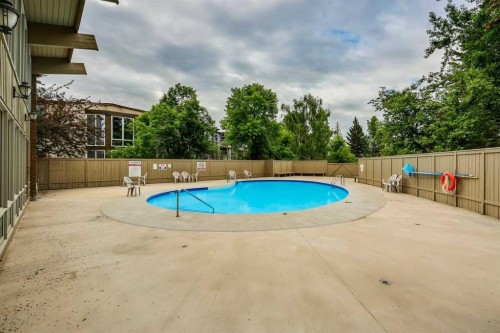 131-820 89 Avenue Sw, Calgary, AB - Outdoor With In Ground Pool