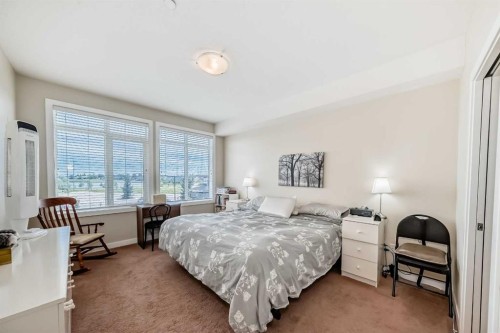 207-1005B Westmount Drive, Strathmore, AB - Indoor Photo Showing Bedroom