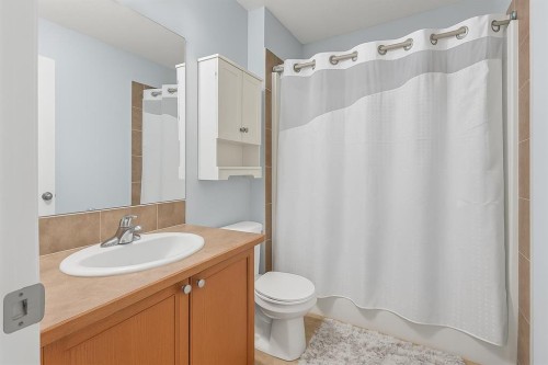 824 Luxstone Square Sw, Airdrie, AB - Indoor Photo Showing Bathroom
