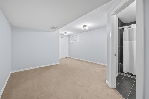 824 Luxstone Square Sw, Airdrie, AB - Indoor Photo Showing Other Room