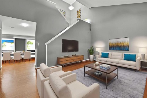 824 Luxstone Square Sw, Airdrie, AB - Indoor Photo Showing Living Room