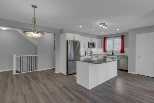 827 Windbury Street Sw, Airdrie, AB - Indoor Photo Showing Kitchen