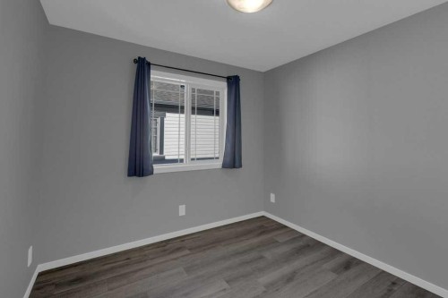 827 Windbury Street Sw, Airdrie, AB - Indoor Photo Showing Other Room