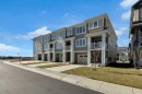 827 Windbury Street Sw, Airdrie, AB  - Outdoor With Balcony With Facade 