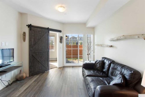 1106-298 Sage Meadows Park Nw, Calgary, AB - Indoor Photo Showing Living Room