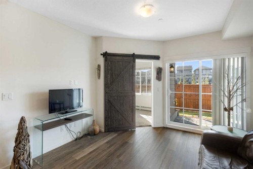 1106-298 Sage Meadows Park Nw, Calgary, AB - Indoor Photo Showing Living Room