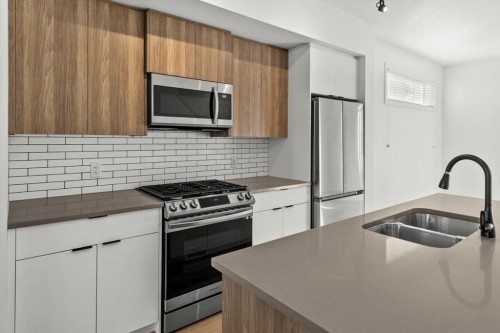 90 Walgrove Common Se, Calgary, AB - Indoor Photo Showing Kitchen With Stainless Steel Kitchen With Double Sink With Upgraded Kitchen